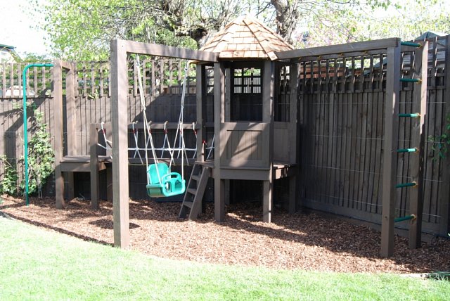 Playframe with rope bridge, play house, monkey bars, swing, fireman's pole 5